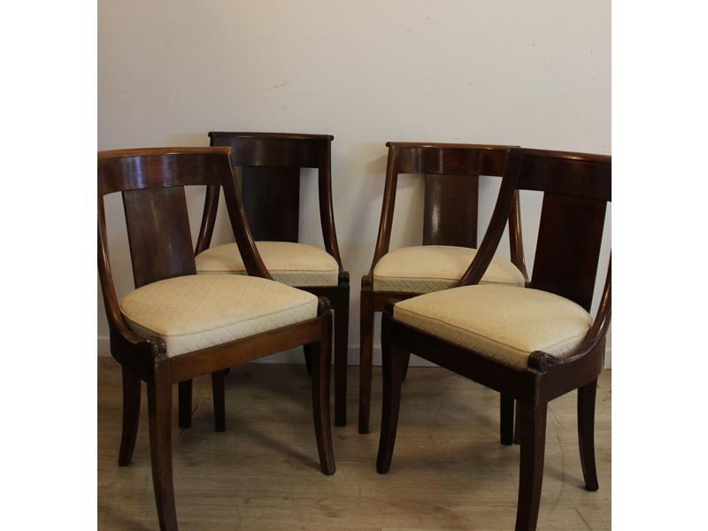 QUATRE CHAISES gondole en acajou et placage...