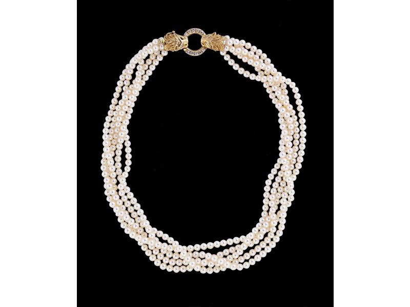 COLLIER RAS DE COU à trois rangs de petites...