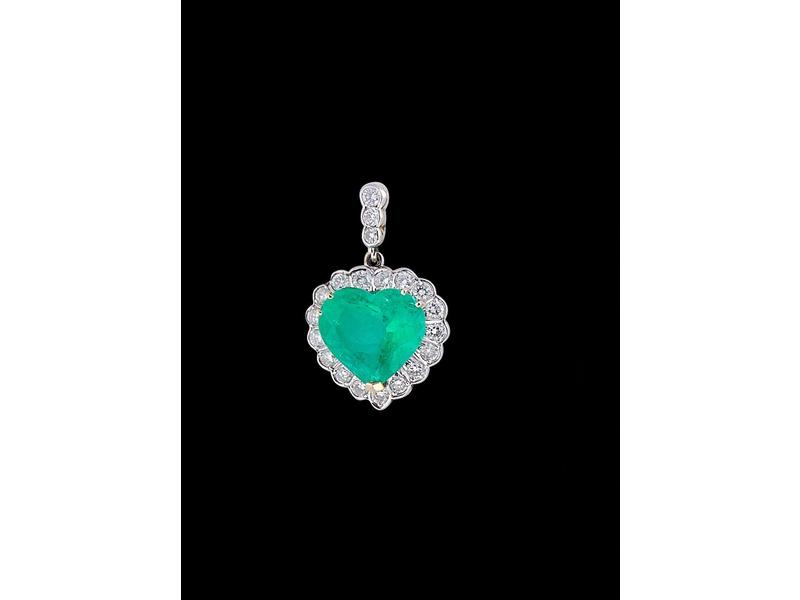 PENDENTIF COEUR en ors jaune et gris (18k)...