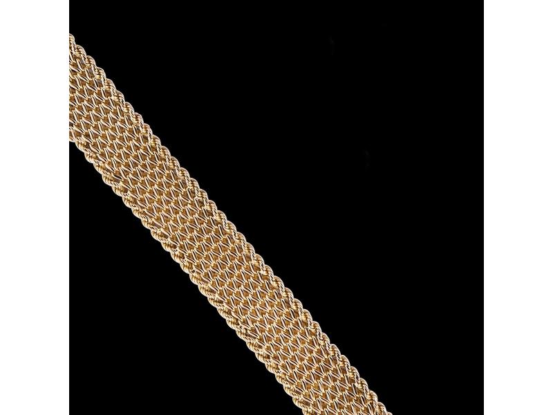 BRACELET souple tressé de chevrons en or...