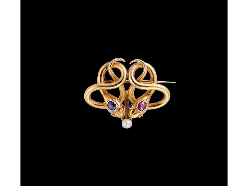 BROCHE en or jaune (18K) à décor de deux...