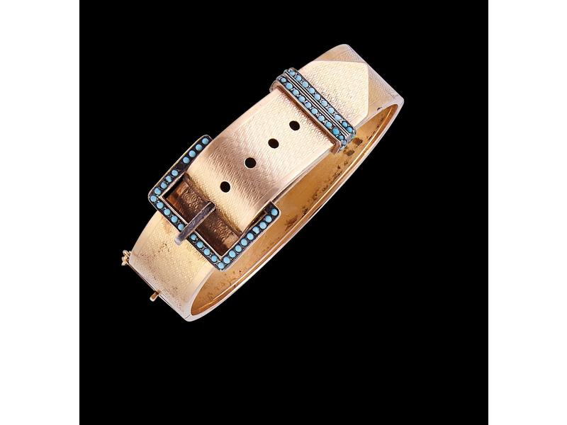 BRACELET rigide articulé en or jaune (18K)...