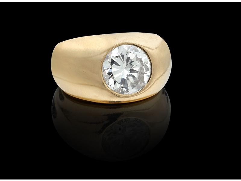BAGUE jonc en or jaune 18k orn e d un diamant