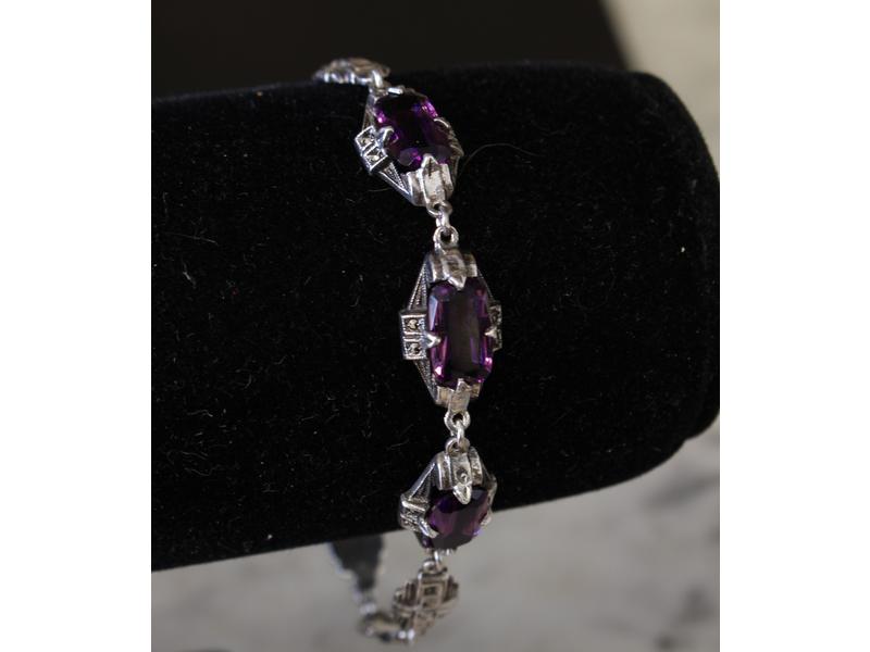 BRACELET en argent (830e) serti de trois...