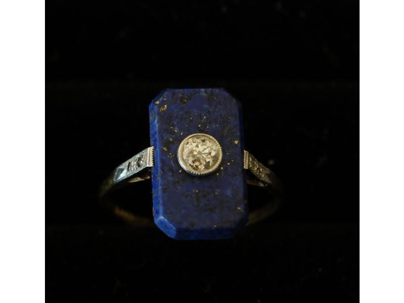 BAGUE en or jaune (18k) et platine sertie...