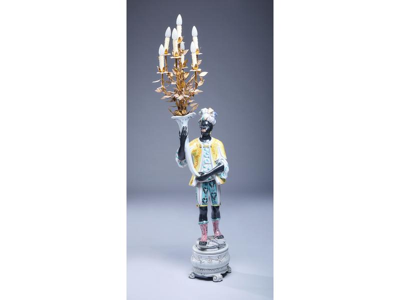 NUBIEN en céramique polychrome portant une...