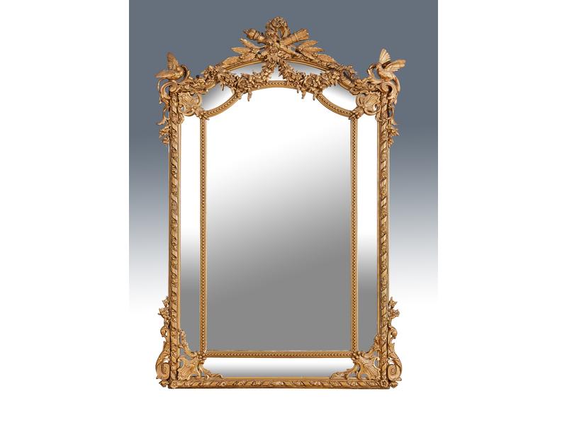 IMPORTANT MIROIR à parcloses en bois et stuc...