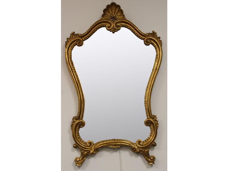MIROIR de forme chantournée dans un cadre...
