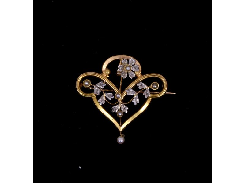 BROCHE pouvant former pendentif en or jaune...