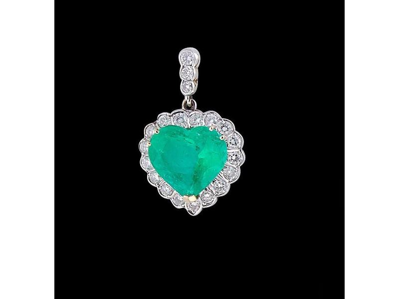 PENDENTIF COEUR en ors jaune et gris (18k)...