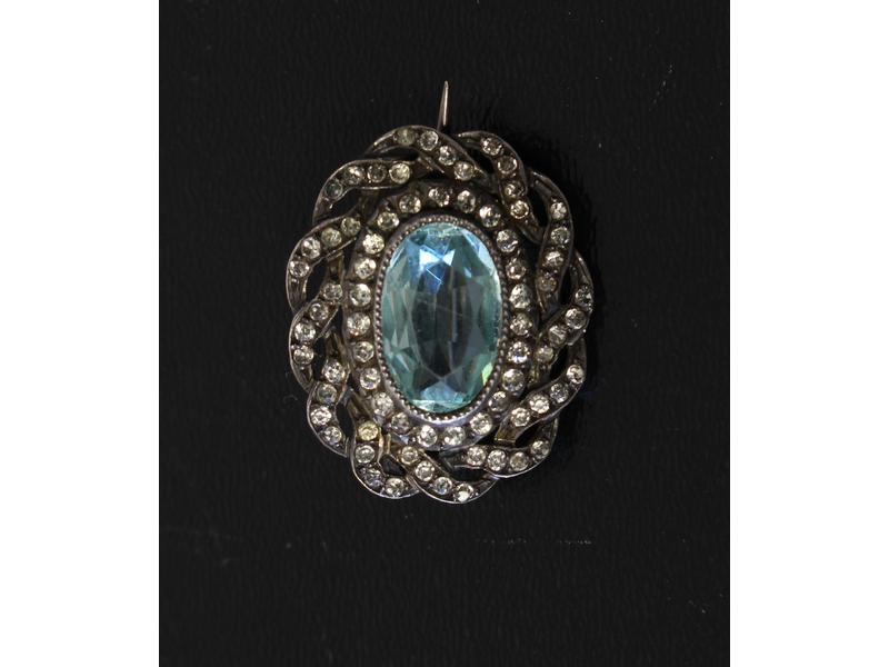 PETITE BROCHE en argent sertie d'une aigue-marine...