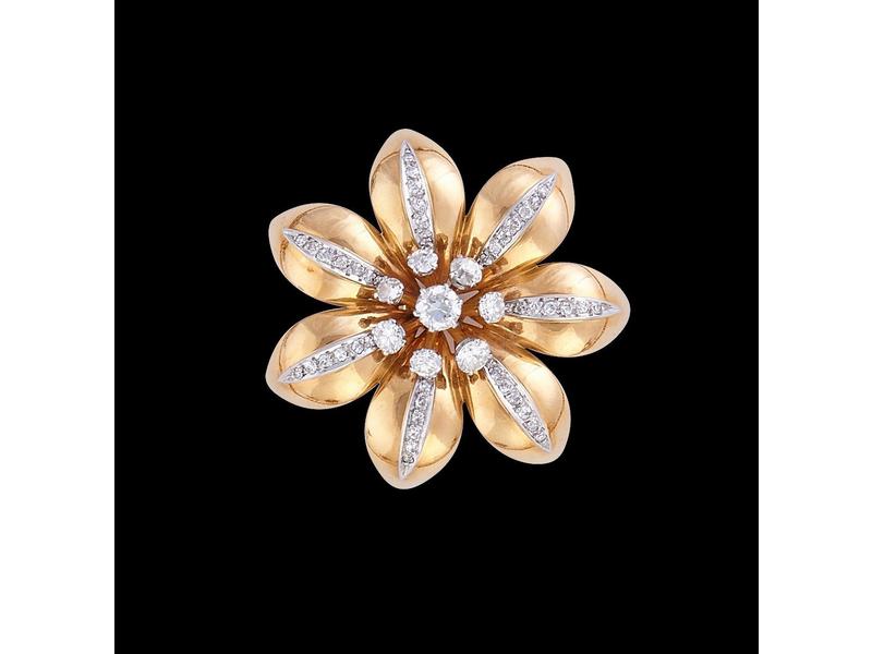 BROCHE FLEUR en or jaune (18K) sertie d'un...