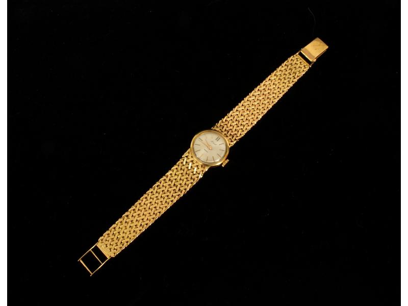 MONTRE BRACELET de dame en or jaune (18K),...