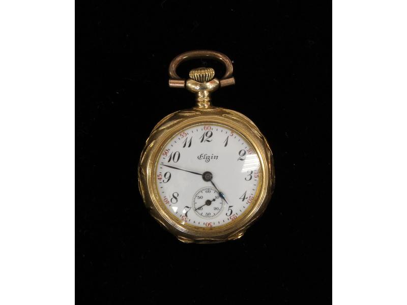 MONTRE DE COL en or jaune (18K), revers à...
