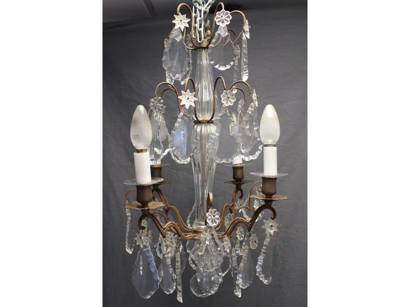 PETIT LUSTRE en bronze à quatre lumières...