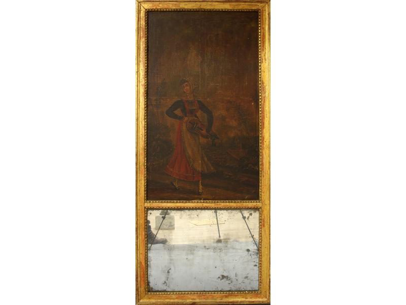 TRUMEAU à décor d'une joueuse de vielle,...