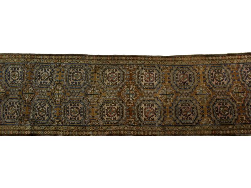 TAPIS GALERIE en laine à décor de médaillons...