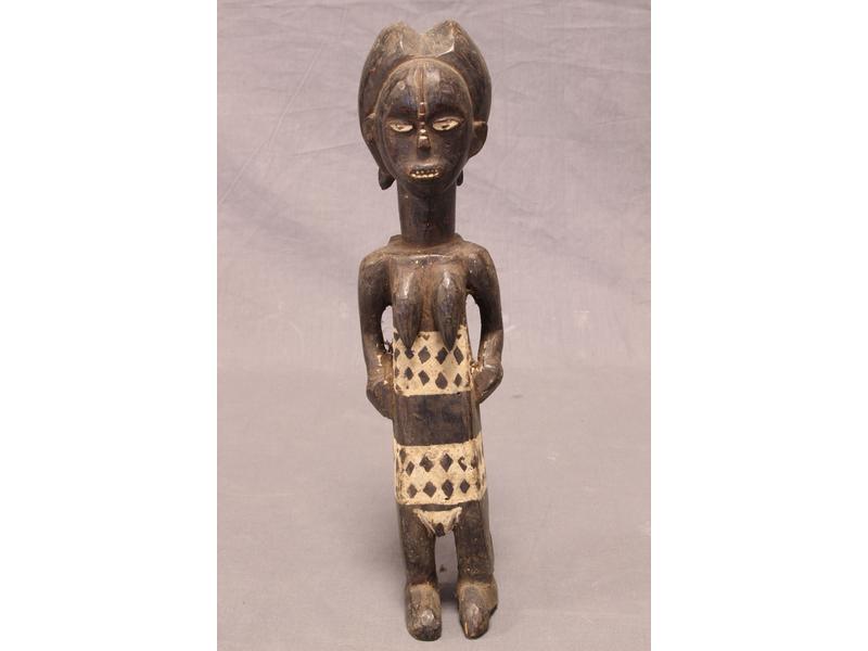 STATUETTE FEMININE en bois sculpté patiné...