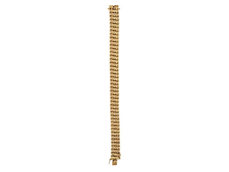 BRACELET en or jaune (18K) à mailles souples...