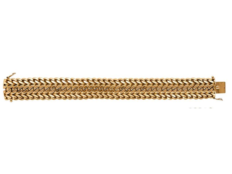 BRACELET en or jaune (18K) à maillons tressés...