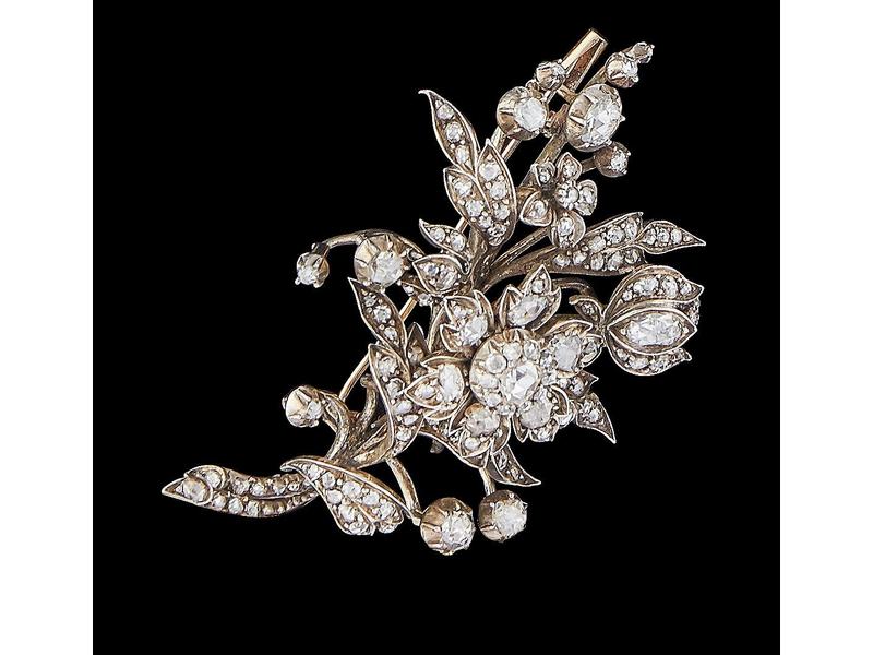 BROCHE en or gris et jaune (14K) sertie de...