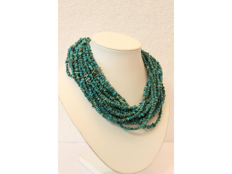 IMPORTANT COLLIER à rangs de turquoises tressés,...