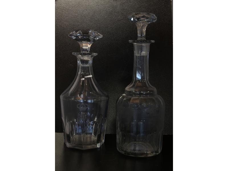 DEUX CARAFES en cristal taillé à godrons,...
