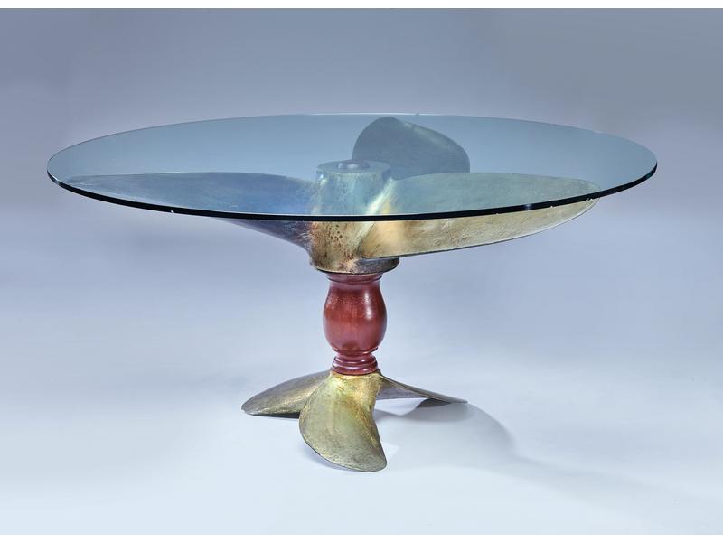 TABLE RONDE à piétement formé de deux hélices...