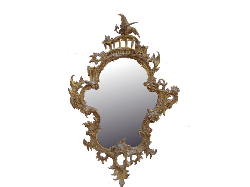 MIROIR de forme chantournée dans un cadre...
