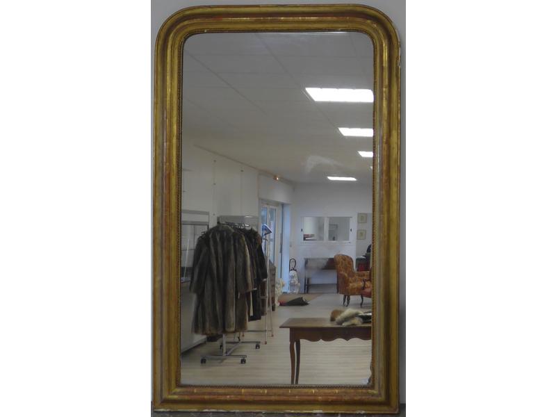 MIROIR de cheminée en bois doré et sculpté...