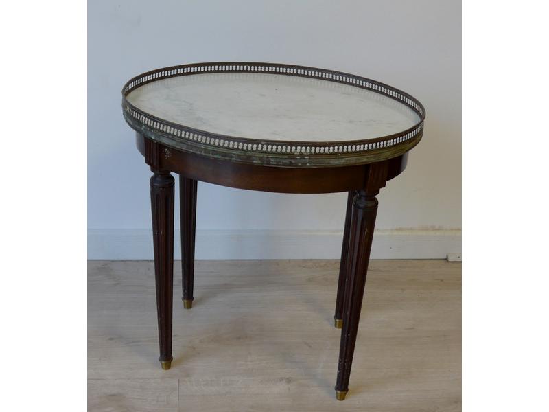 PETITE TABLE BASSE ovale en acajou et placage...