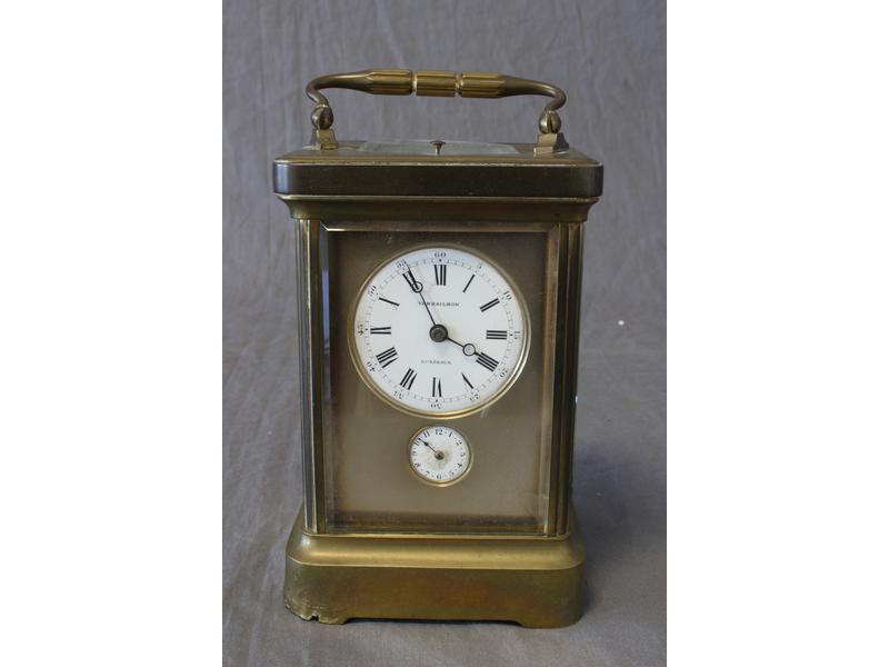 PENDULE cage dite d'officier, en bronze et...