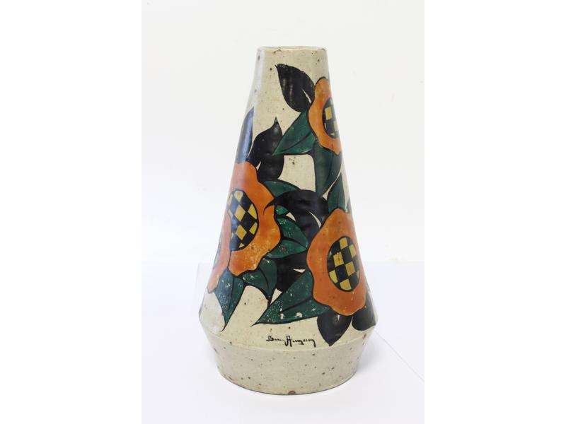 VASE conique en faience émaillée à décor...