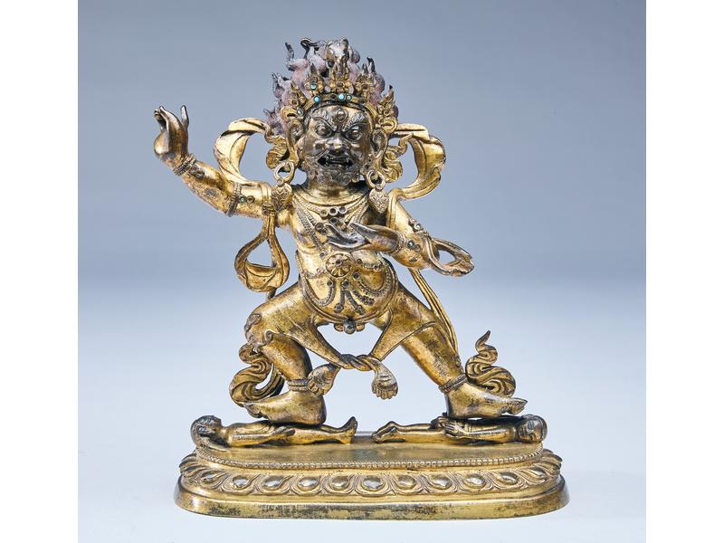 STATUETTE en bronze doré représentant le...