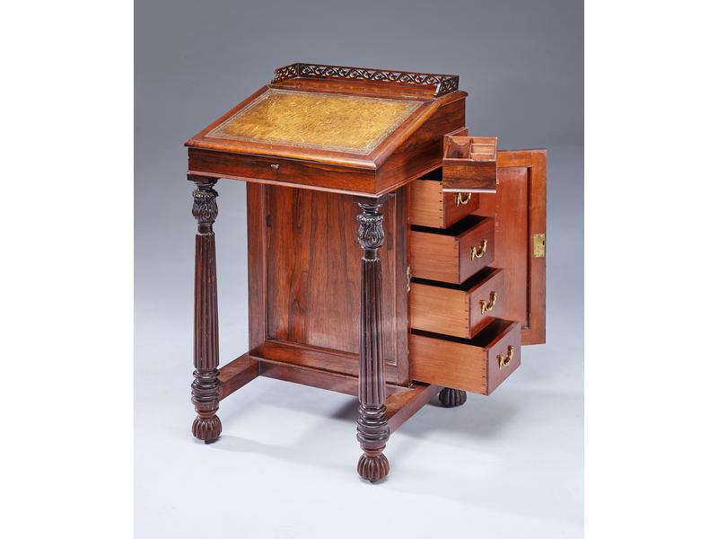 BUREAU DAVENPORT en palissandre et placage...