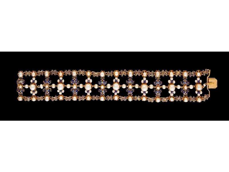 BRACELET en or jaune (18K) à trois rangs...