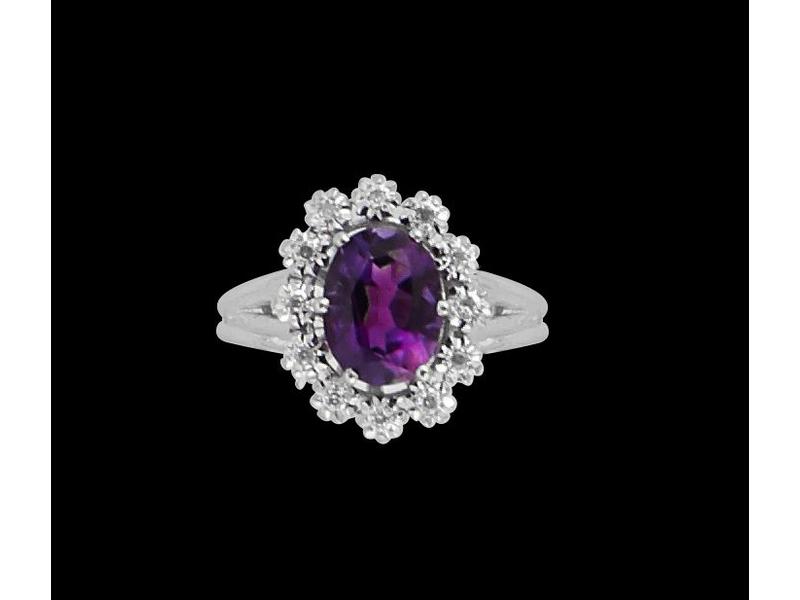 BAGUE type marguerite en or gris (18K) ornée...