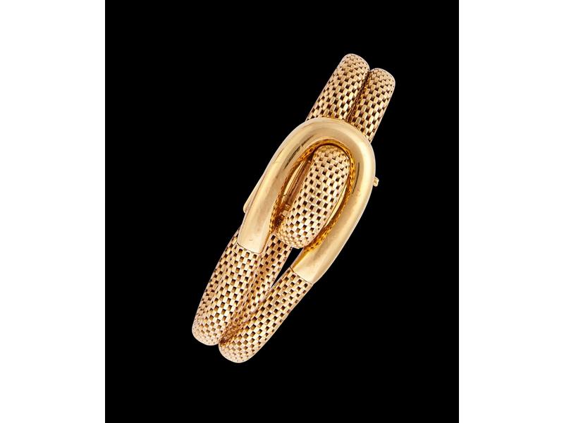 BRACELET-MONTRE DE DAME en or jaune (18K)...