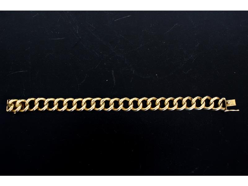 BRACELET type gourmette en or jaune (18K)...