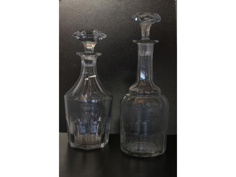 DEUX CARAFES en cristal taillé à godrons,...