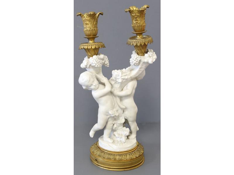 BOUGEOIR à deux bras de lumière en bronze...