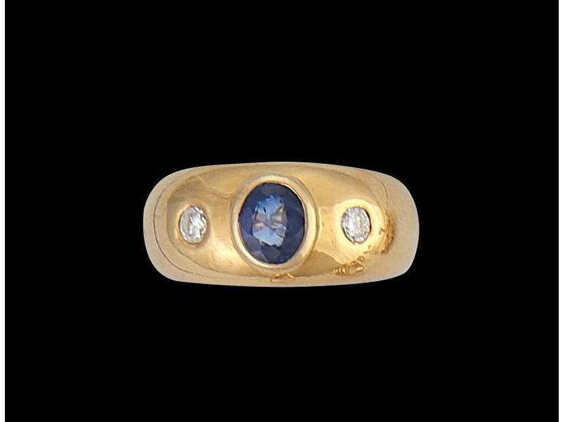 BAGUE jonc en or jaune 18K, ornée d'un saphir...