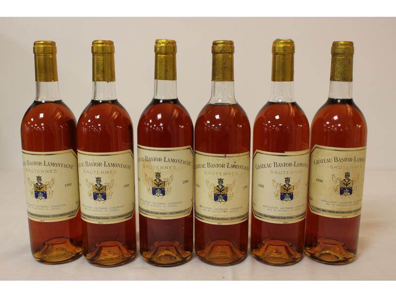 6 Blles CH. BASTOR LAMONTAGNE Sauternes 1990
Et....