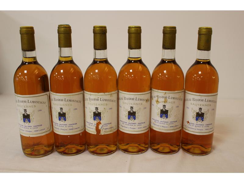 6 Blles CH. BASTOR LAMONTAGNE Sauternes 1986
Et....