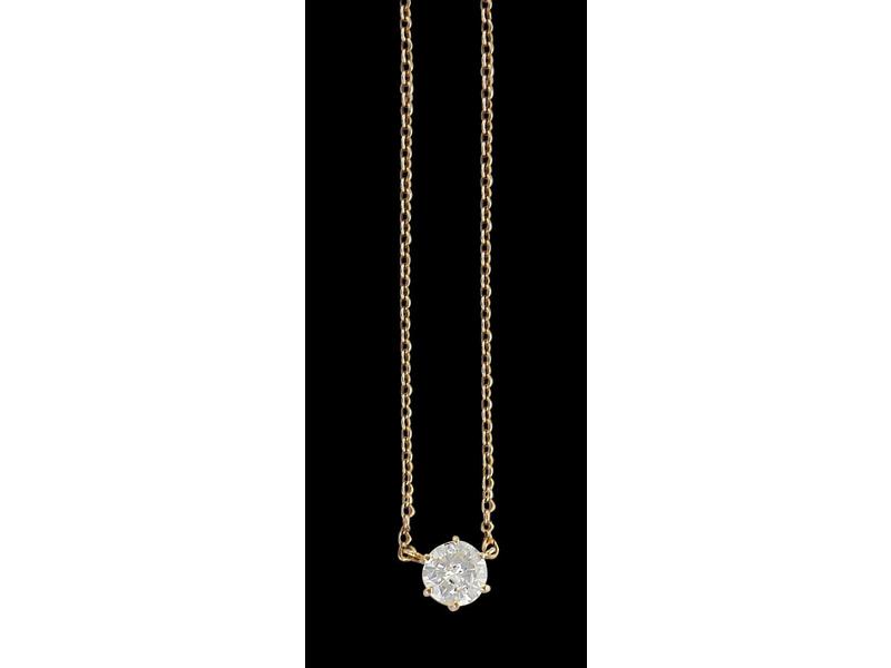 DIAMANT demi-taille brillant monté en pendentif...