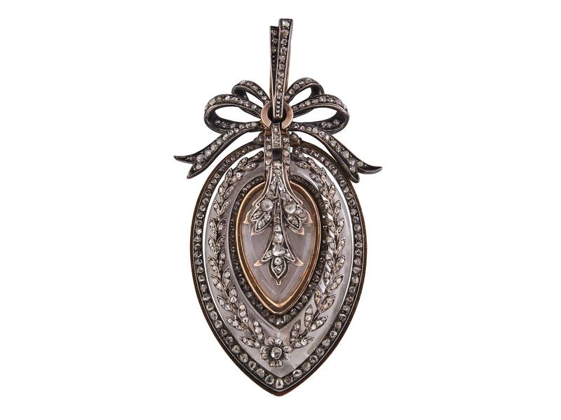 JOLI PENDENTIF articulé en or jaune 18K,...