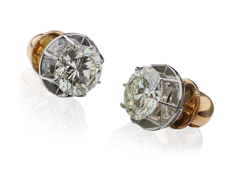 DEUX DIAMANTS taille brillants, montés en...
