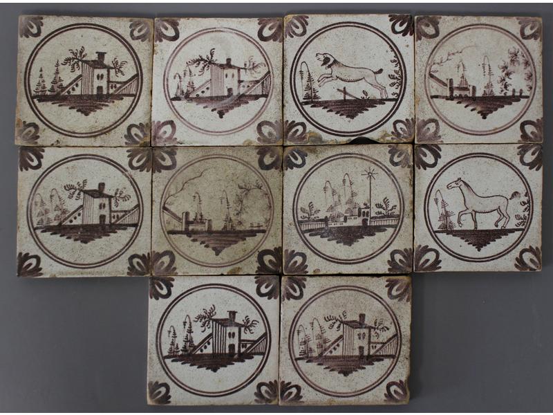 DIX CARREAUX carrés en faïence à décor manganèse...