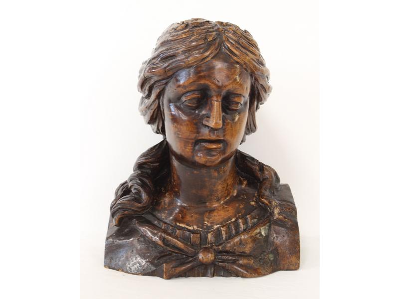 BUSTE DE FEMME en bois sculpté, probablement...