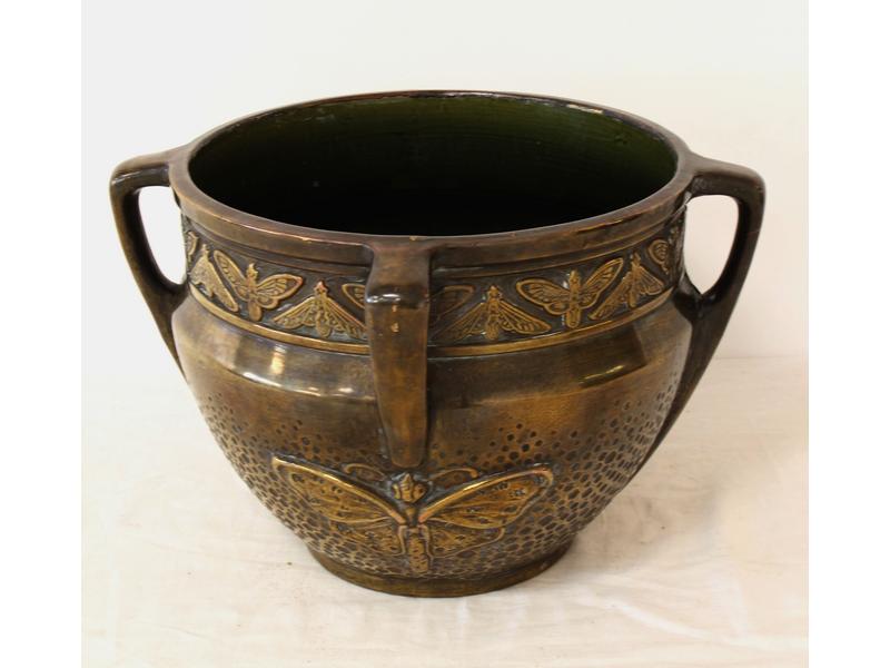 CACHE-POT en faïence émaillée bronze et apliquée...